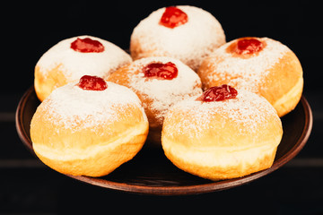 Obraz na płótnie Canvas sweet donuts with jelly
