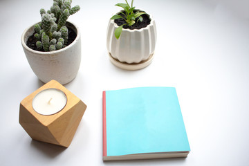 home decorarion on white table, indoor decor close up picture 