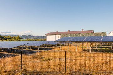 Solar power panels ,Photovoltaic modules for innovation green energy for life with blue sky background.