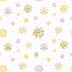 Christmas seamless pattern with golden and silver snowflakes. Christmas decoration gift wrapping paper.