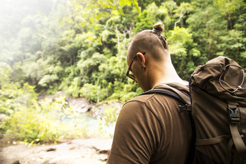 Man in a forest.
Young man walking thru the jungle. Asia, Thailand, Koh Chang. 