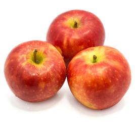 Fototapeta na wymiar Three whole red Kanzi apples isolated on white background
