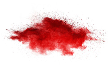 Splash of red powder over white background.