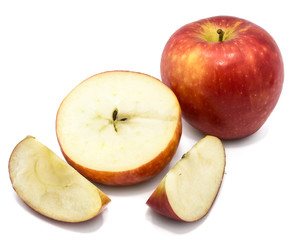 Naklejka na ściany i meble Sliced apples Kanzi, one whole, cross section half, two slices, isolated on white background