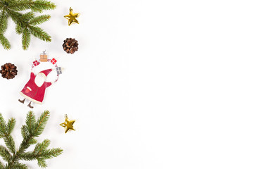 Christmas background with fir branches, pine cones and Xmas decoration on white background