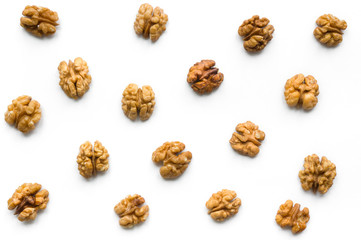 Walnut pattern backdrop. Nuts on white background. Top view. 