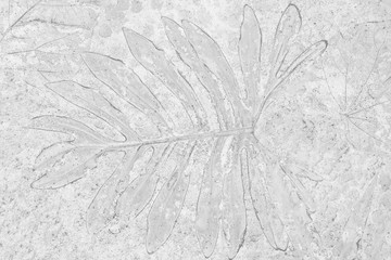 marks of leaf on the gray concrete background.