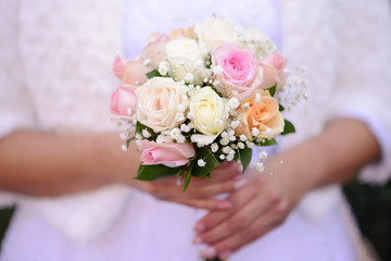 Obraz na płótnie Canvas Wedding's bouquet in vintage style, soft pastel tones