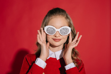 teenage girl in glittering glasses