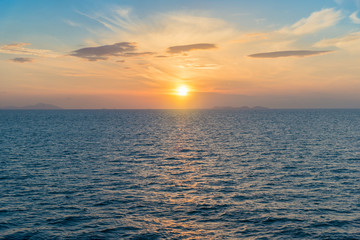 Sunrise sky morning over tropical beach at Phuket province, Southern of Thailand
