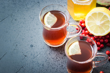 Lemon spiced tea with honey. Selective focus, close up, copy space.
