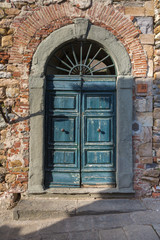 Fototapeta na wymiar Close-up of Ancient Green Wooden Door