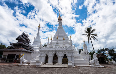 Naklejka premium Beautiful of Lanna temple Wat Phra That Doi Kong Mu with blue sky .Mae Hong Son province,Thailand.