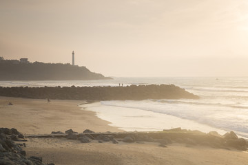 Fototapeta premium Lighthouse and Beach at Dusk, Biarritz