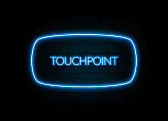 Touchpoint  - colorful Neon Sign on brickwall