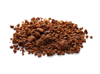 Crunchy granola, muesli pile with chocolate isolated on white background