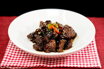 wok fried pork stir fry with sweet peppers and chinese vegetables