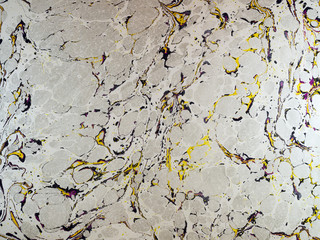 Marbled paper background.