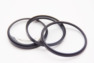 Camera Lens Filter Over White Background