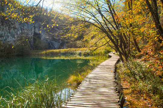  Beautiful landscape, river stream and wooden path in the Plitvice Lakes National Park in Croatia © ilijaa