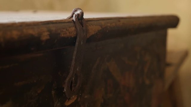 Metal latch in abandoned house room slow motion  footage - Close-up movements of old chest lock part shallow DOF