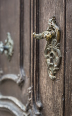 Grunge background - rusty antique door knocker