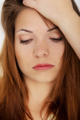 Obraz premium Young woman with headache.