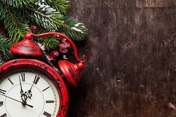 Christmas fir tree and alarm clock