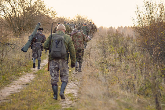 group of hunters during hunting in forest. chase hanting