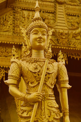 Fototapeta premium Golden temple guardian in Chachoensao