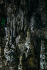 Limestone stalactites in Adygeya underground cave, speleology grotto
