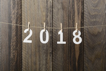 Año nuevo de 2018, números colgando de una cuerda