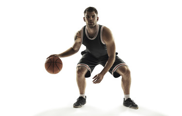 Basketball player in action isolated on white background