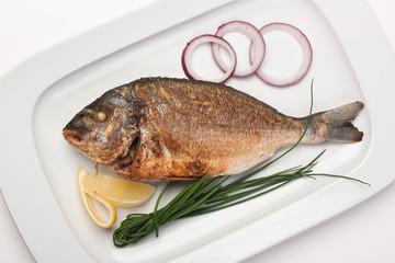 dish of fried fish with onions