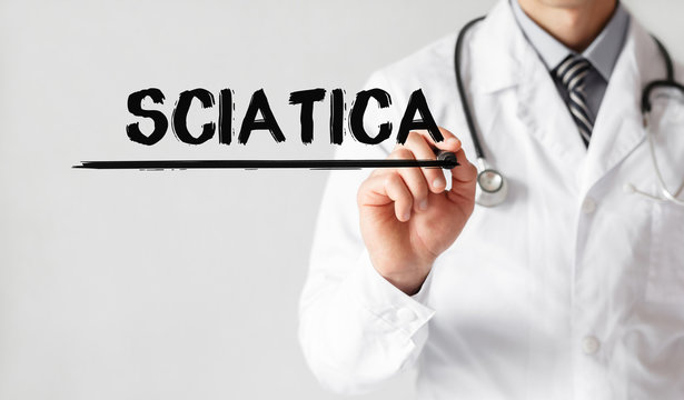 Doctor writing word Sciatica with marker, Medical concept