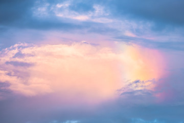 Naklejka na ściany i meble Beautiful background colorful rainbow over the clouds after rains.