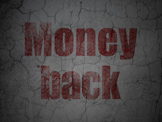 Finance concept: Red Money Back on grunge textured concrete wall background
