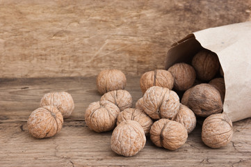 walnuts in a kraft paper bag