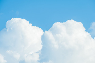 Naklejka na ściany i meble Clse up shot, Beautiful white clouds over the blue sky.