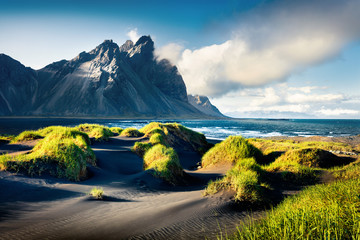 Black sand dunes on the Stokksnes headland on southeastern Icelandic coast with Vestrahorn (Batman...