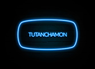 Tutanchamon  - colorful Neon Sign on brickwall - obrazy, fototapety, plakaty