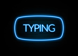 Typing  - colorful Neon Sign on brickwall