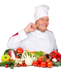 smiling chef with fresh vegetables