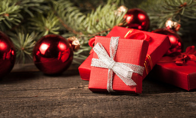 Luxury New Year gifts, different present boxes under Christmas tree in holiday eve, Christmastime celebration, home decorated with festive shiny balls, magic night