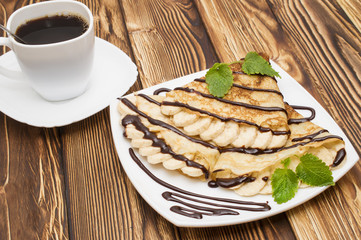 Crepes with Banana, Chocolate with cup of coffee