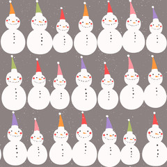 Winter holidays seamless pattern. Snowmen in colored Christmas hats on light brown background.