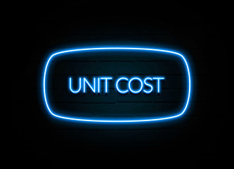 Unit Cost  - colorful Neon Sign on brickwall