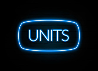 Units  - colorful Neon Sign on brickwall