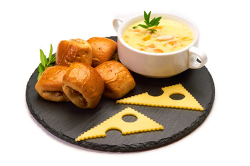 Meat pies, buns with delicious cheese cream soup, isolated on white background.