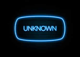 Unknown  - colorful Neon Sign on brickwall